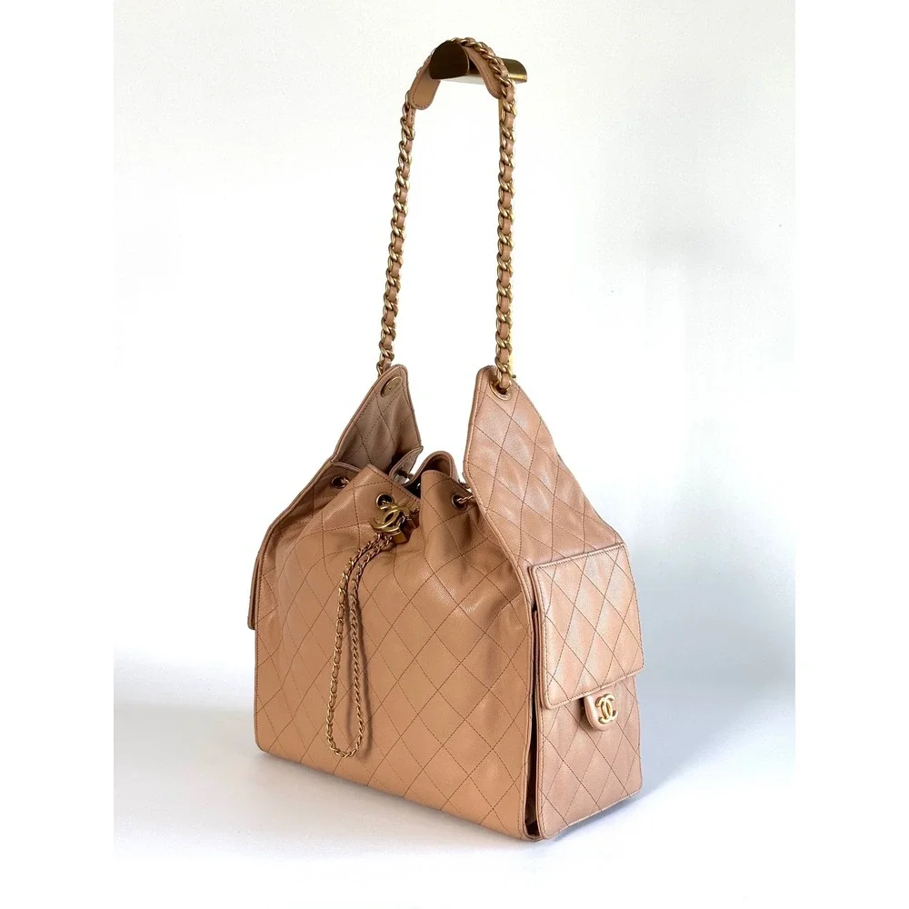 Chanel 25 Quilted Caviar Leather Beige Gold Hardware Drawstring CC, medium siz